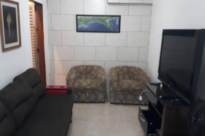 Casa a 5 minutos a pé da Praia da Enseada!